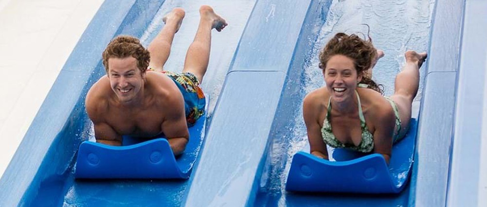 man-and-woman-on-mat-racer Man and woman on mat racer water slide