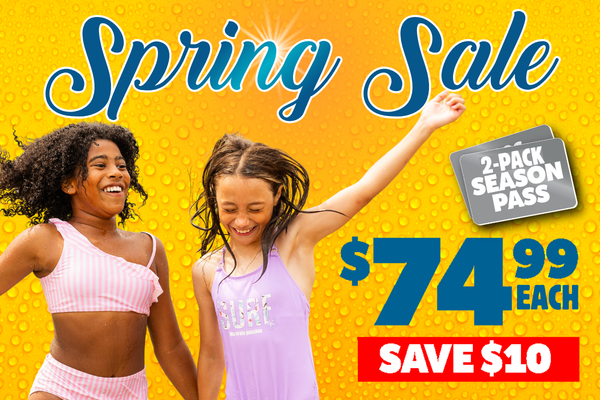 Man and woman on mat racer water slide